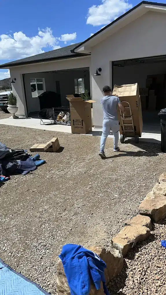 man moving boxes for a relocation service